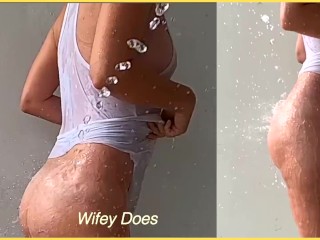 Hot wife gets fully wet braless in a white shirt