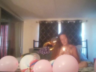 Horny Cute Girl pops balloons with cigarettes and take off her clothes then plays with her pussy