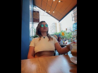 Enjoying my coffee while wearing an Underboob top, flashing everyone in public.