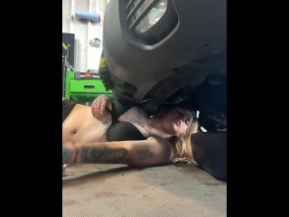 Sexy mechanic strips down and changes oil.