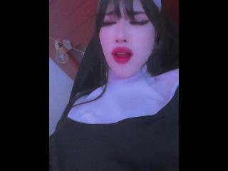 This horny nun plays with her pussy and a vibrator