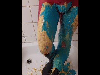 Thick coloured slime on pink pantyhose