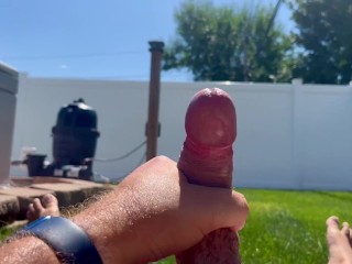 Bearded and tattooed husband jerks off outside to video of MILF wife with cumshot on self