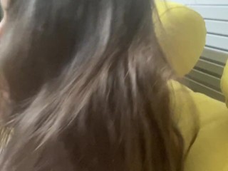 Women let you watch her shiny dark hair and play with them. Close view