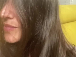 Women let you watch her shiny dark hair and play with them. Close view