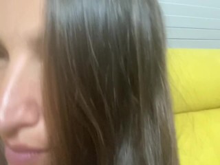 Women let you watch her shiny dark hair and play with them. Close view