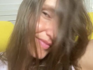 Women let you watch her shiny dark hair and play with them. Close view