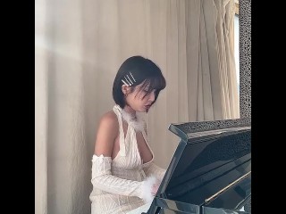 piano girl with big boobs