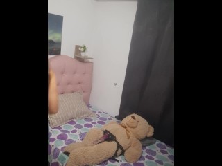 Hot nerdy girl fucks her teddy bear with a strapon in her bedroom