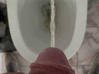 Man pissing in the office toilet, cock view in 4K