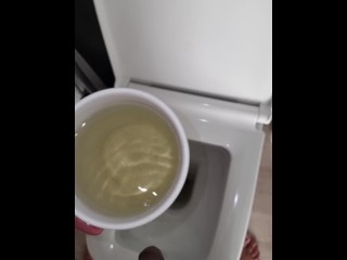 Pissing in cup