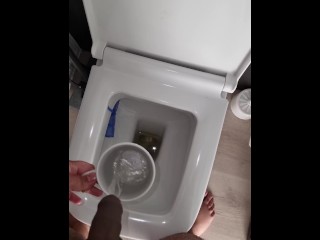 Pissing in cup