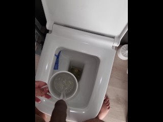 Pissing in cup