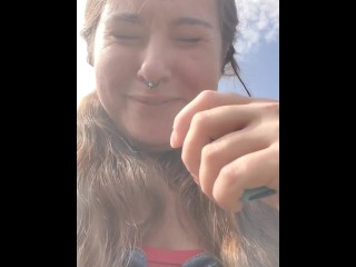 Pigtailed Teen Vapes Outside