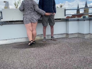 Gorgeous pissing mother-in-law helps son-in-law piss on the top of the parking lot