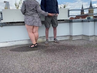 Gorgeous pissing mother-in-law helps son-in-law piss on the top of the parking lot