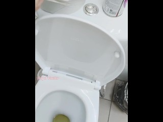Girl pissed on panties and the floor in a public toilet after holding urine for a long time