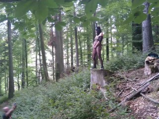 Standing pissing in a woods in a bunny mask and fishnet