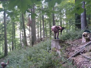 I masturbate and stick a dildo in my pussy while standing on a wooden stump