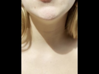 Blonde teen is smoking and spitting loogies coughing hocking phlegm with long tongue