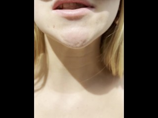 Blonde teen is smoking and spitting loogies coughing hocking phlegm with long tongue