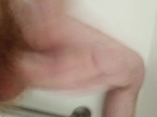 Watch me jerk my long cock in the shower and cum hard.
