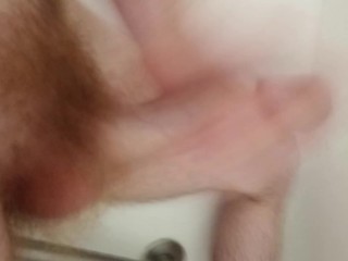 Watch me jerk my long cock in the shower and cum hard.