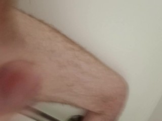 Watch me jerk my long cock in the shower and cum hard.