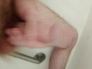 Watch me jerk my long cock in the shower and cum hard.