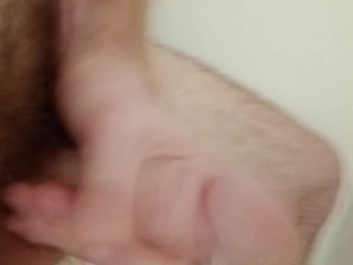 Watch me jerk my long cock in the shower and cum hard.