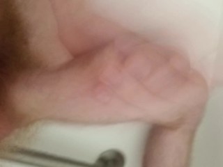 Watch me jerk my long cock in the shower and cum hard.