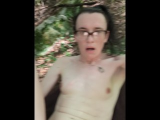 Beautiful mtf transgender woman fucking herself with a glass dildo in the woods