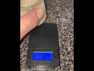 A couple ounces of my cum!!!! Weighing my frozen cum loads on a scale-53.7grams