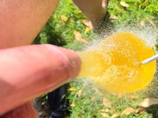 Popping a piss filled condom 4K