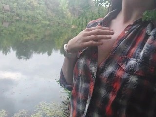Girl masturbates by the lake