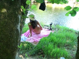 SOLO GIRL EXHIBITING OUTDOOR AT THE RIVER