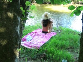 SOLO GIRL EXHIBITING OUTDOOR AT THE RIVER