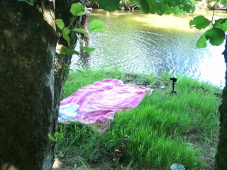 SOLO GIRL EXHIBITING OUTDOOR AT THE RIVER