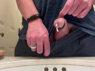 Pissing with a cock plug in. 4K