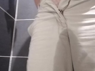 Pulling down freshly wet pants and masterbating and squirting a little.