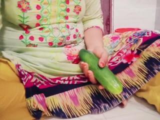 Beautiful housewife fucking with cucumber in pussy.