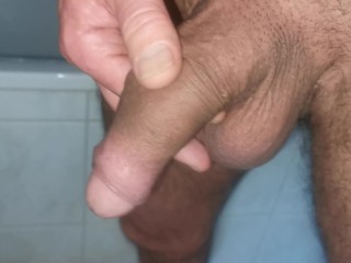 Semi hard uncut cock piss