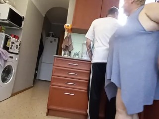 in the morning in the kitchen, a fat woman jerks off my cock to a cumshot