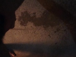 Spraying piss all over the cement floor and making a mess