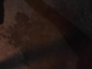 Spraying piss all over the cement floor and making a mess