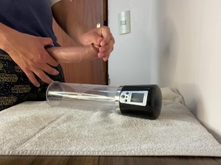 Big dick getting sucked by the suction of an automatic penis pump