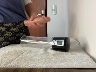 Big dick getting sucked by the suction of an automatic penis pump