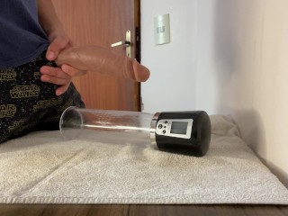 Big dick getting sucked by the suction of an automatic penis pump