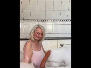 Big brown dildo fucking in the bath