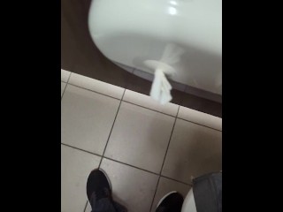 Stripping completely naked in public toilet